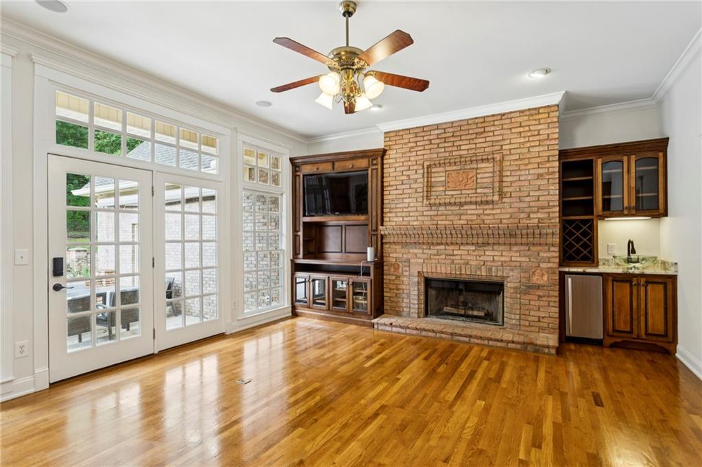 2115 Euharlee Road Taylorsville, GA 30178 - Photo 26 of 66 a living room with fireplace furniture and a wooden floor