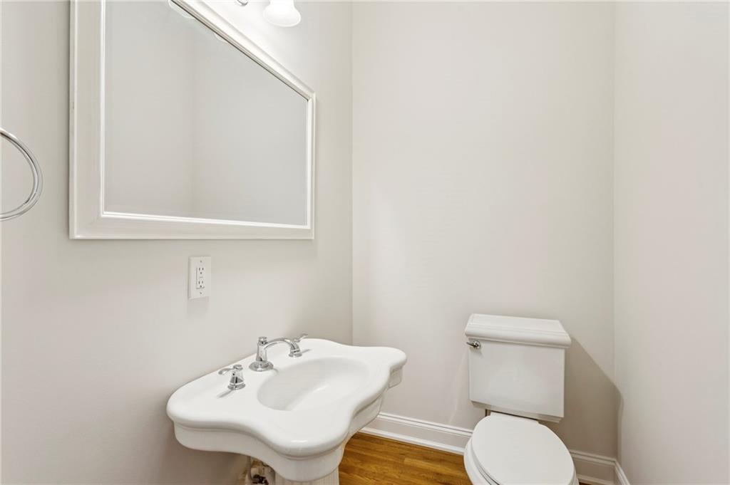 2115 Euharlee Road Taylorsville, GA 30178 - Photo 30 of 66 a white toilet sitting next to a bathroom sink