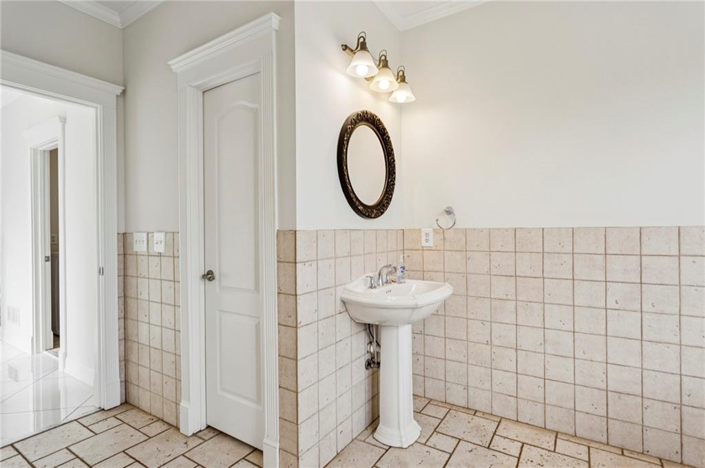 2115 Euharlee Road Taylorsville, GA 30178 - Photo 37 of 66 a bathroom with a sink a toilet and shower