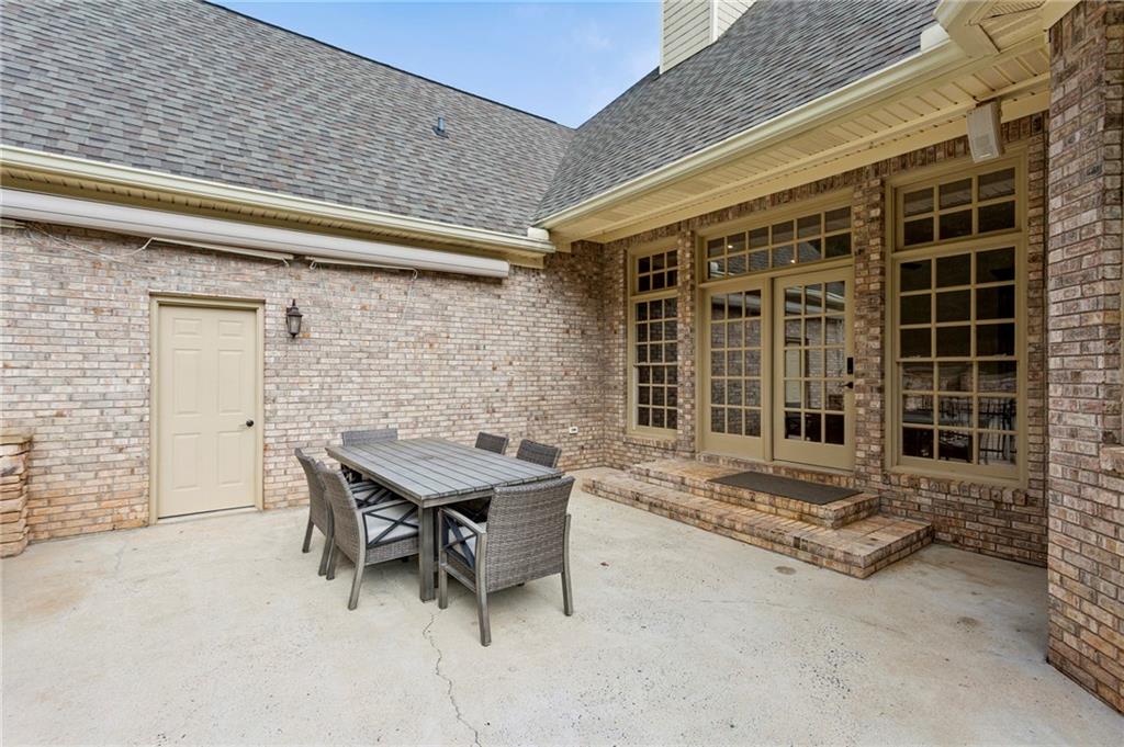 2115 Euharlee Road Taylorsville, GA 30178 - Photo 58 of 66 a backyard of a house with table and chairs