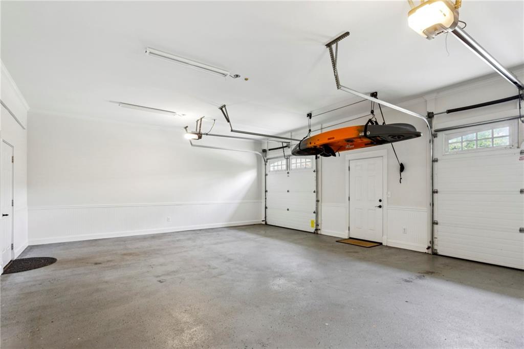 2115 Euharlee Road Taylorsville, GA 30178 - Photo 65 of 66 an empty room with wooden floor and ceiling fan