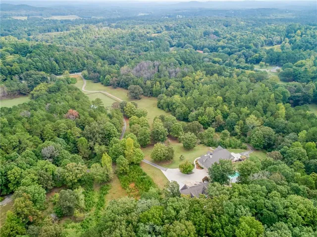 a view of a big yard with an outdoor space