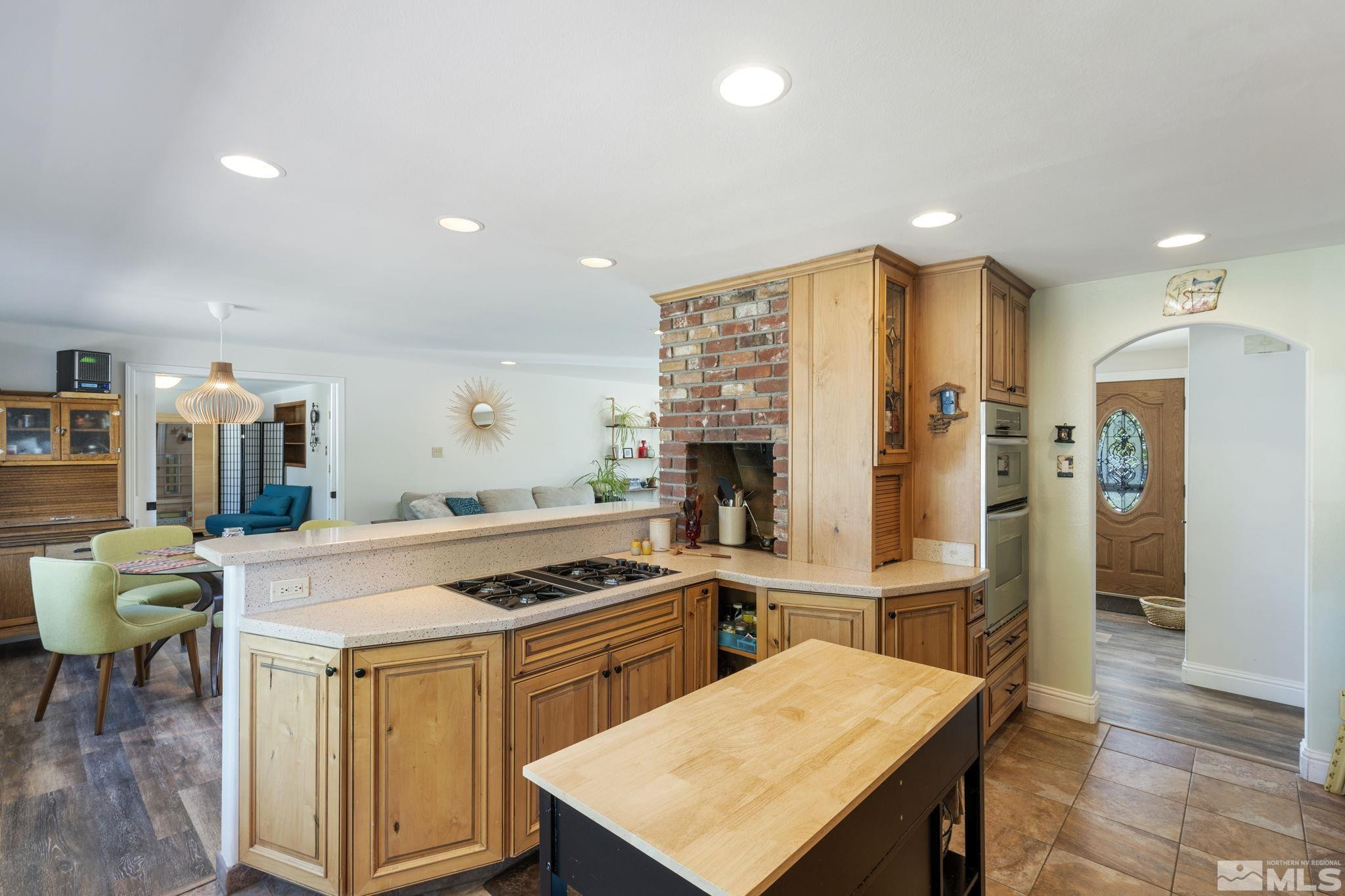 1000 Sumac Street Reno, NV 89509 - Photo 15 of 40 a kitchen that has a table and chairs in it
