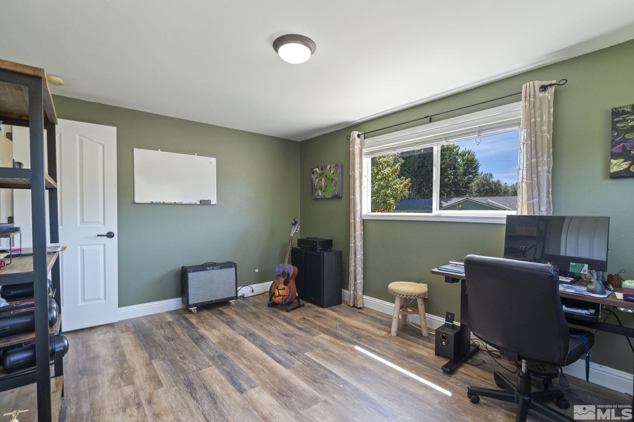 1000 Sumac Street Reno, NV 89509 - Photo 23 of 40 a view of a workspace with furniture and a window