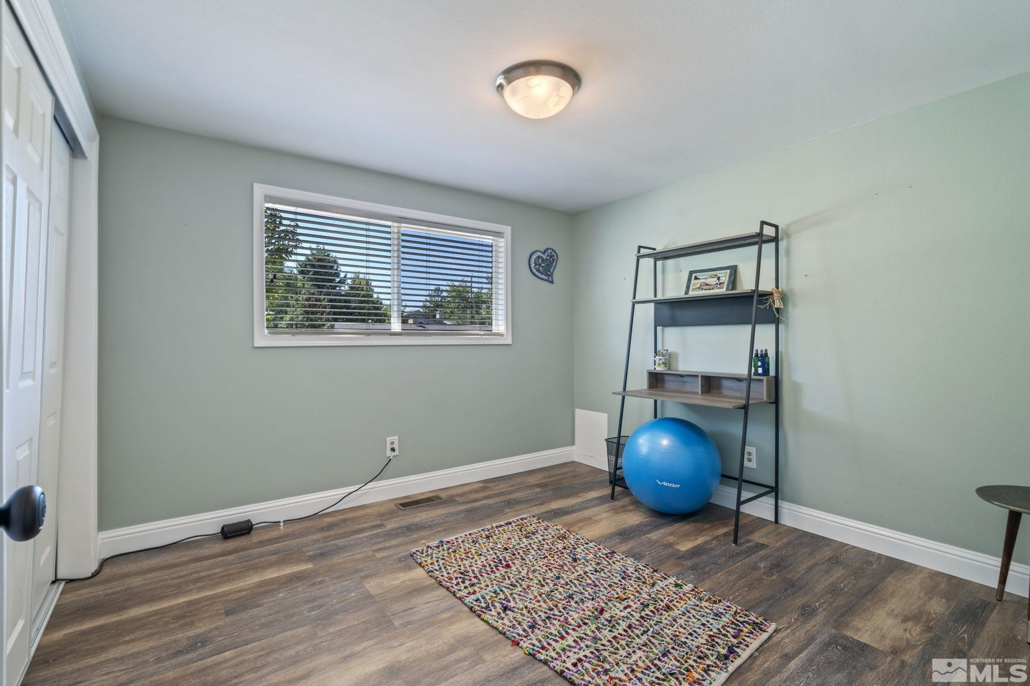 1000 Sumac Street Reno, NV 89509 - Photo 24 of 40 a view of wooden floor in an empty room with a window