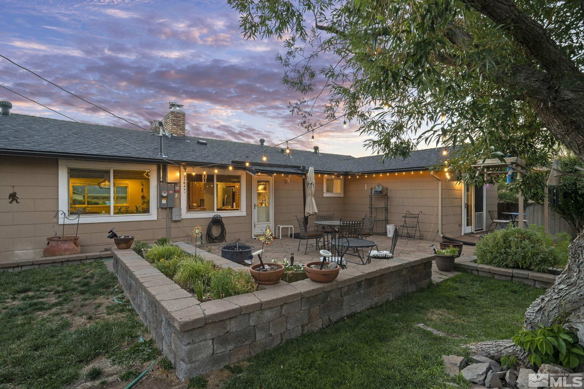 1000 Sumac Street Reno, NV 89509 - Photo 29 of 40 a front view of house with yard and outdoor seating