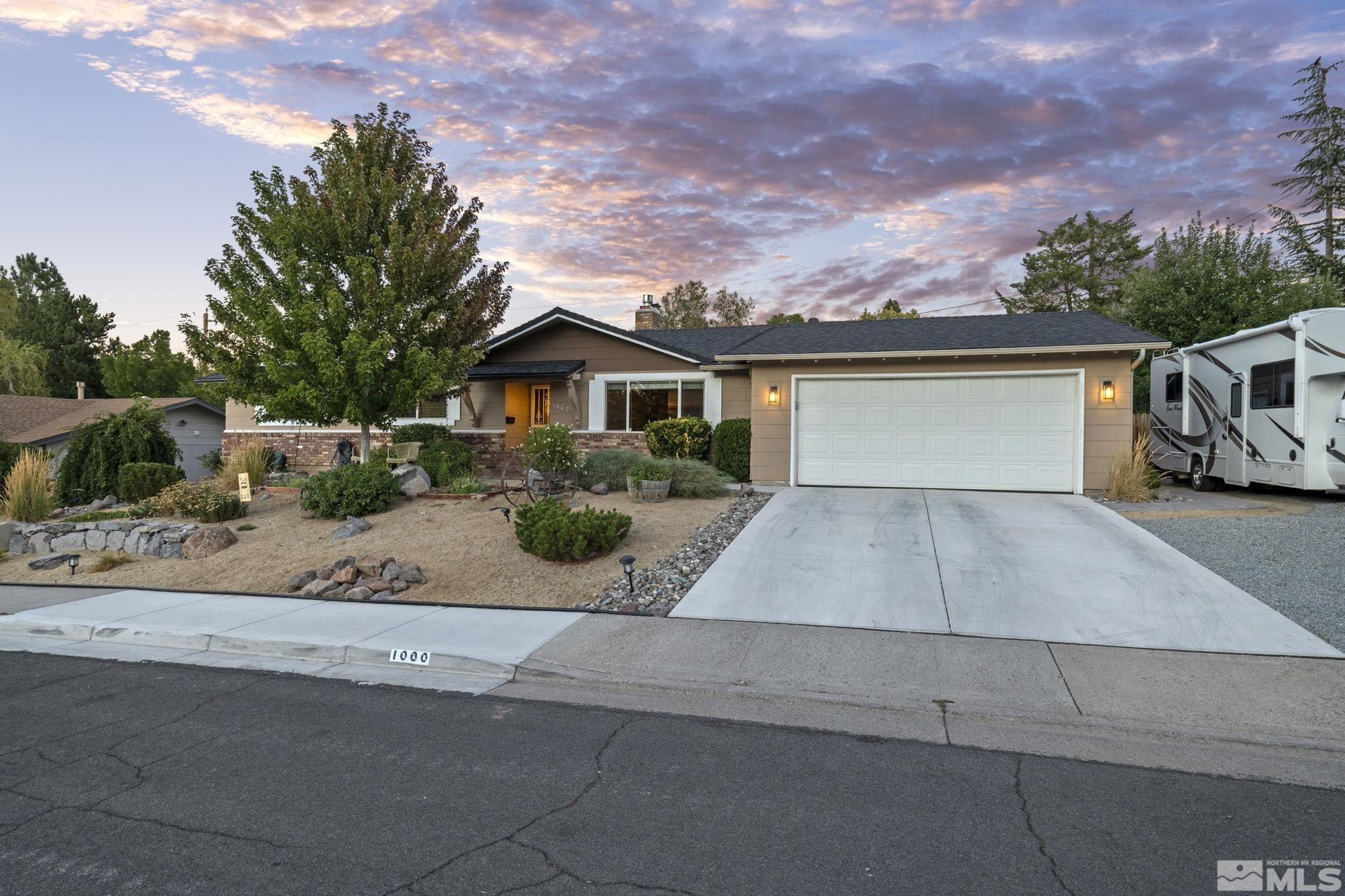 1000 Sumac Street Reno, NV 89509 - Photo 32 of 40 front view of house with a yard and car parked