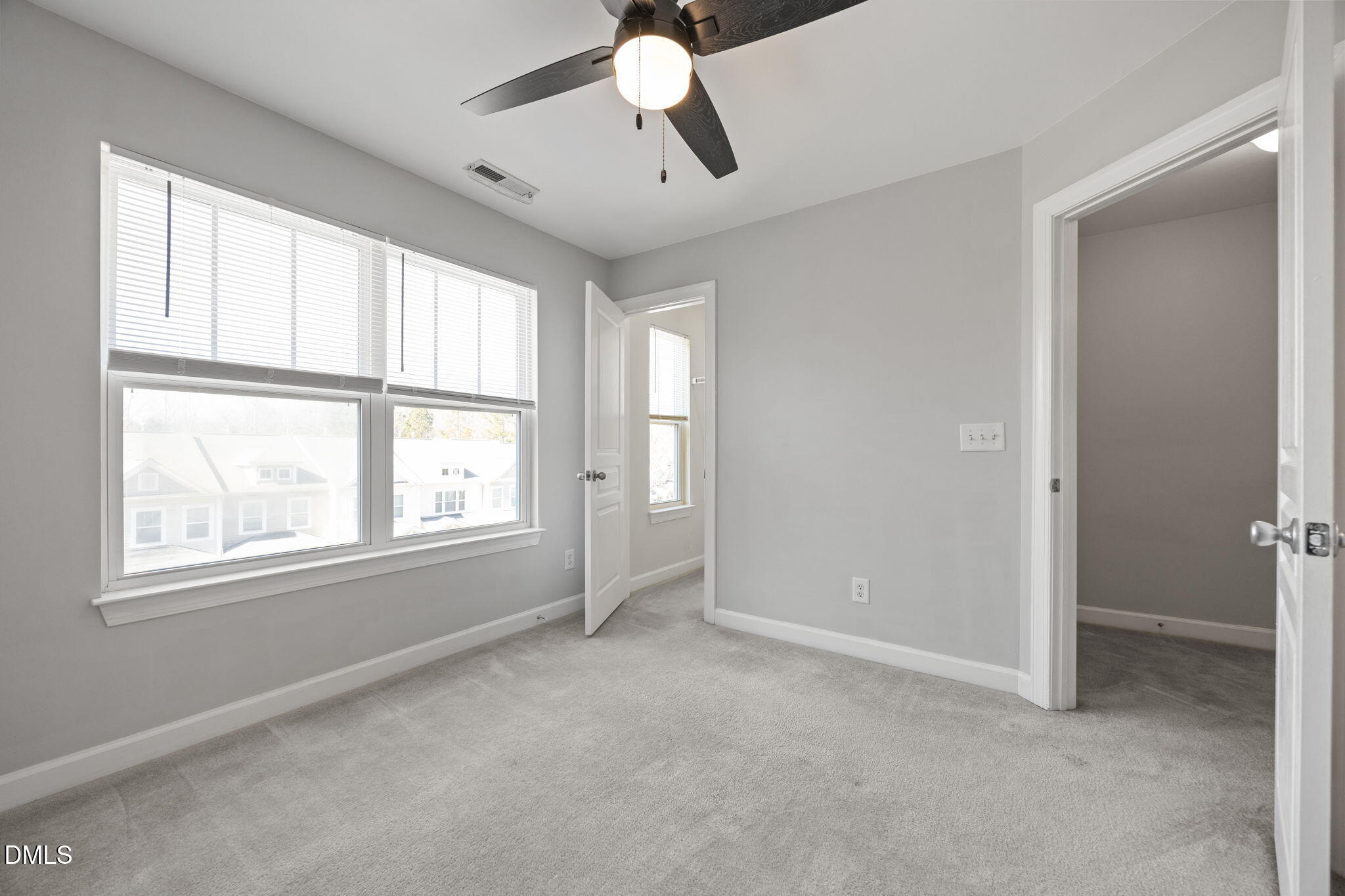 8006 Goldenrain Way Raleigh, NC 27612 - Photo 24 of 40 a view of an empty room with a window