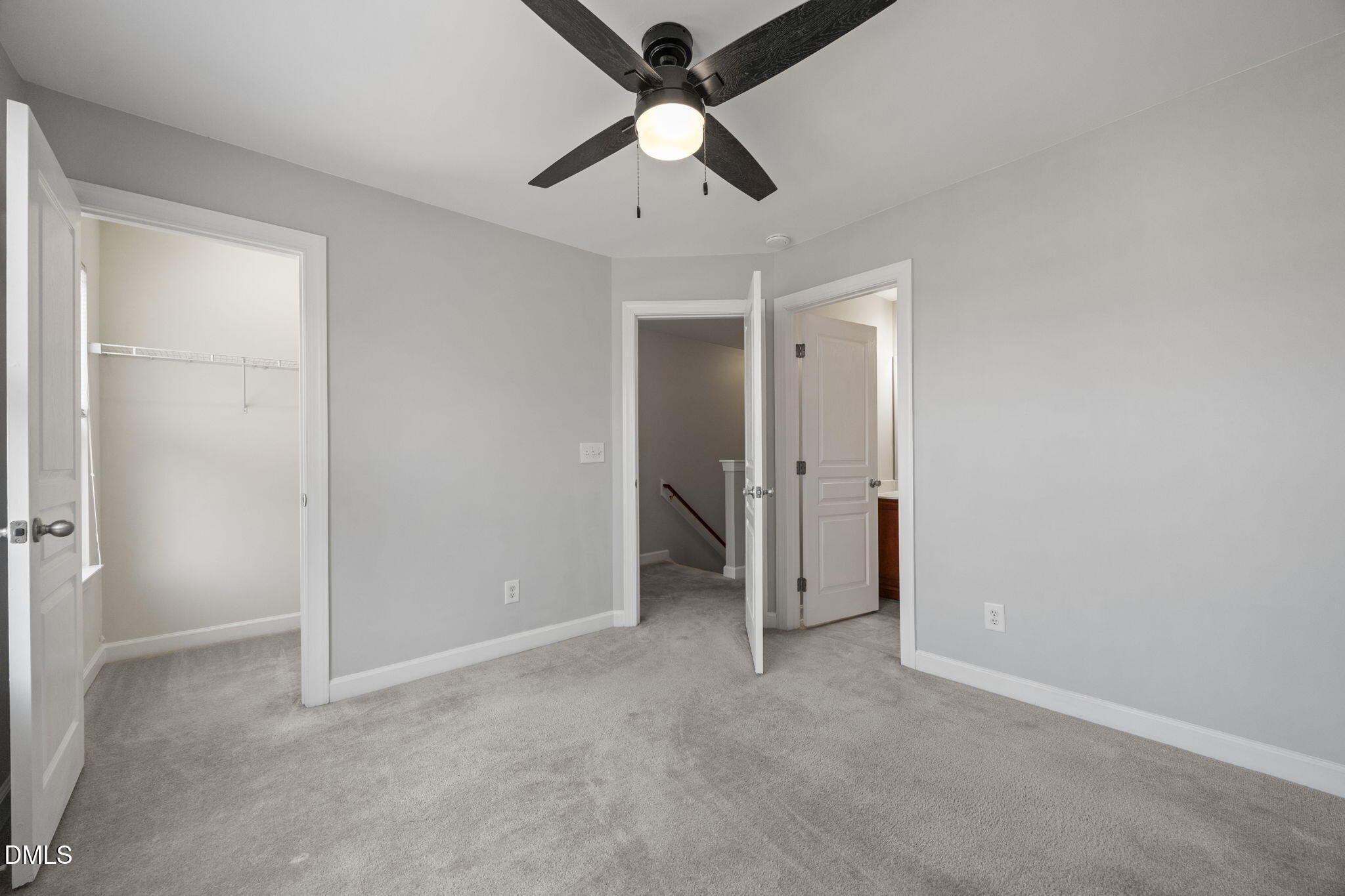 8006 Goldenrain Way Raleigh, NC 27612 - Photo 26 of 40 a view of an empty room and chandelier fan