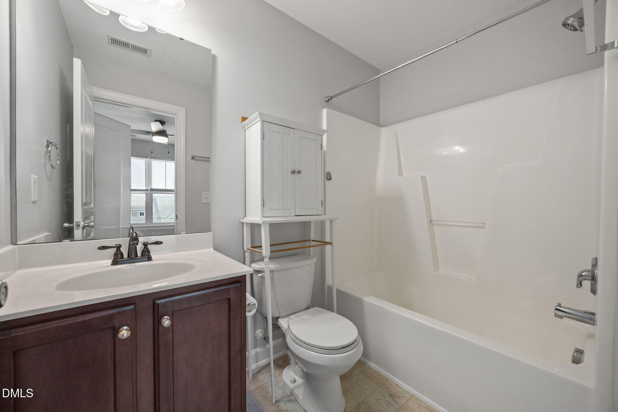 8006 Goldenrain Way Raleigh, NC 27612 - Photo 27 of 40 a bathroom with a sink toilet tub and shower