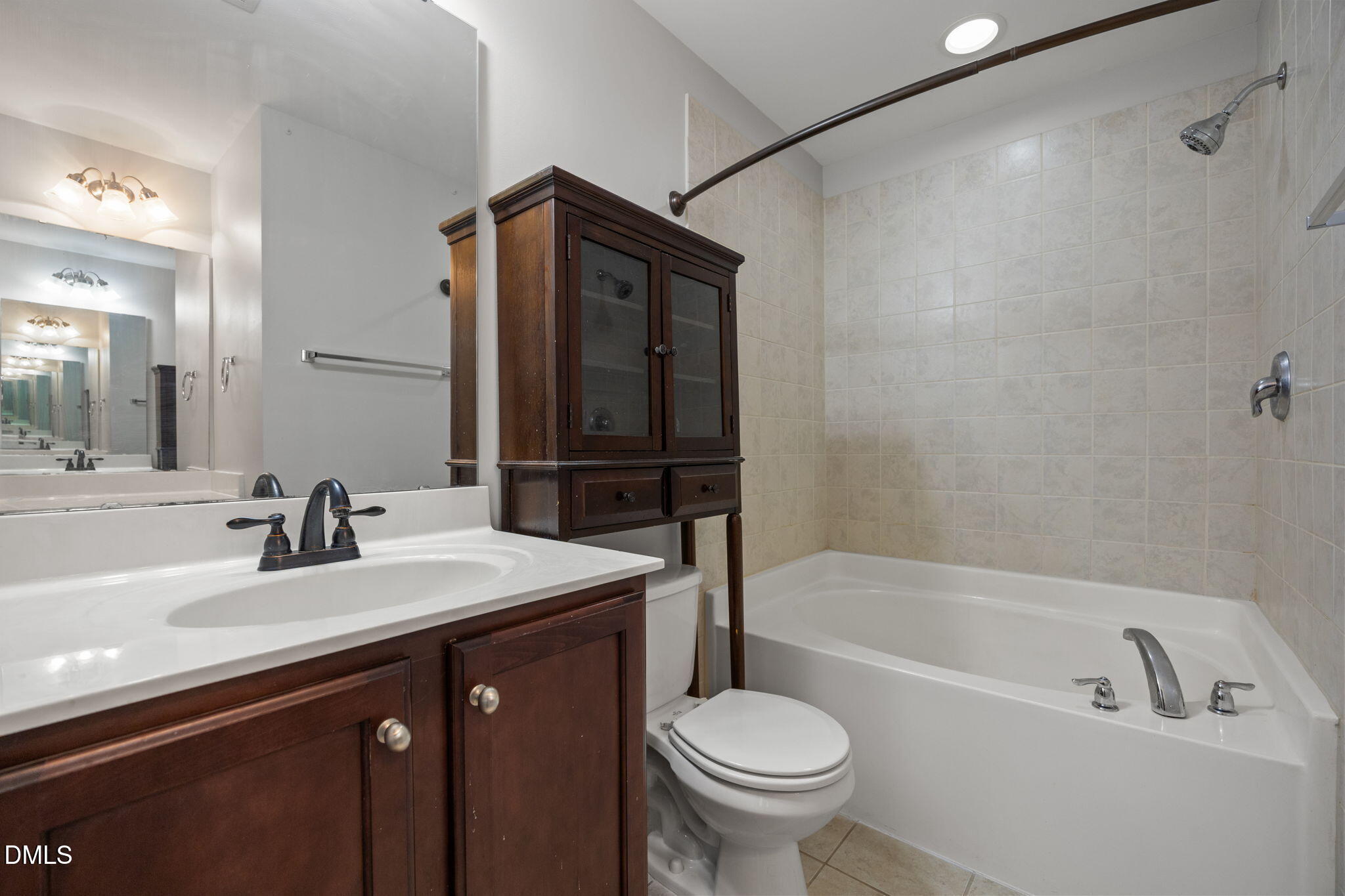 8006 Goldenrain Way Raleigh, NC 27612 - Photo 31 of 40 a bathroom with a sink a toilet and a bathtub