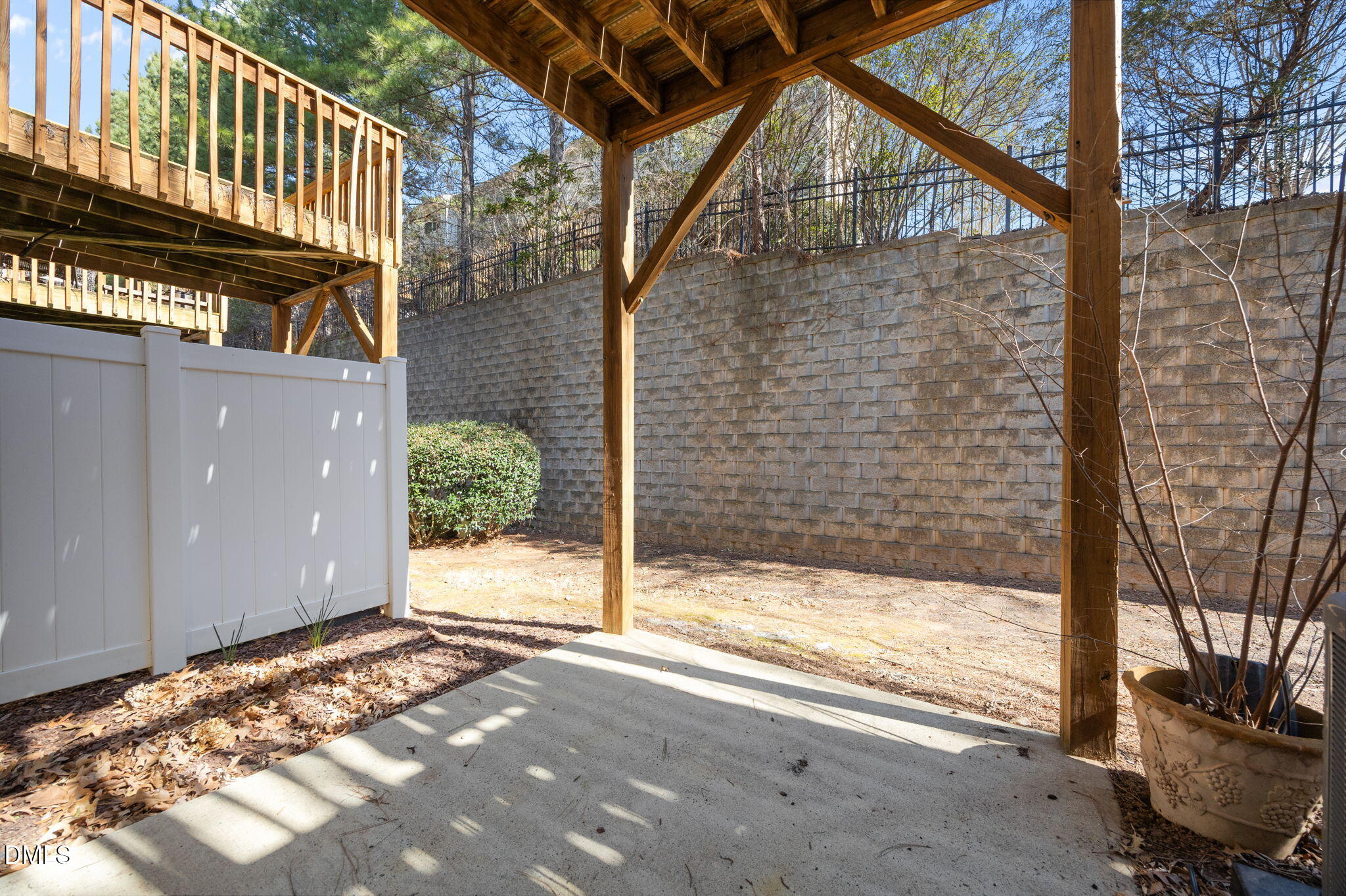 8006 Goldenrain Way Raleigh, NC 27612 - Photo 34 of 40 a view of a wooden door