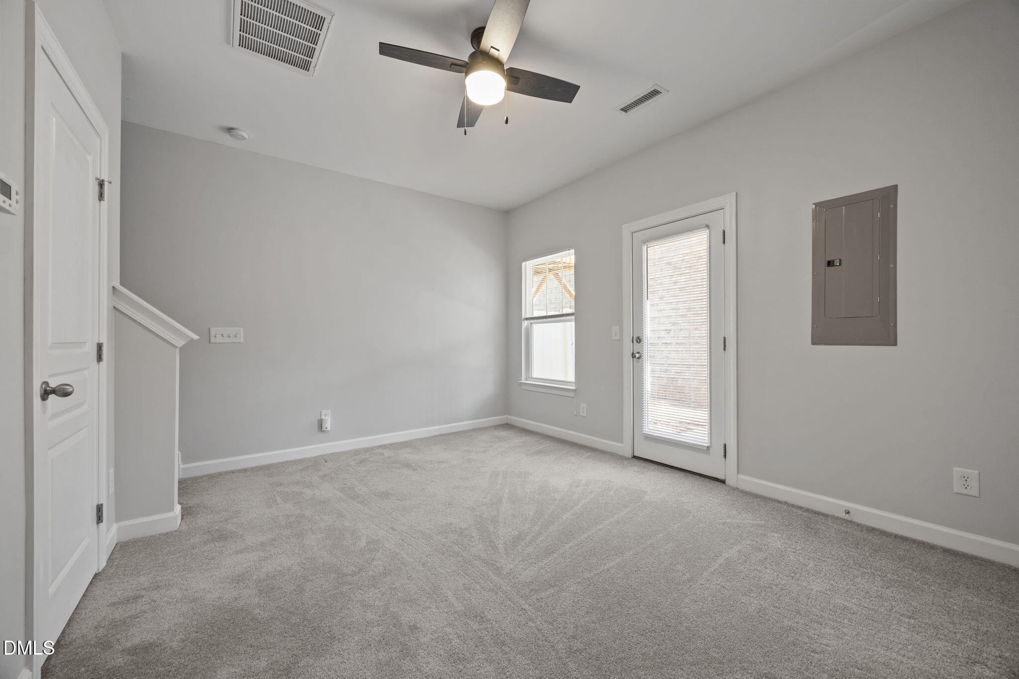 8006 Goldenrain Way Raleigh, NC 27612 - Photo 5 of 40 a view of an empty room with a window