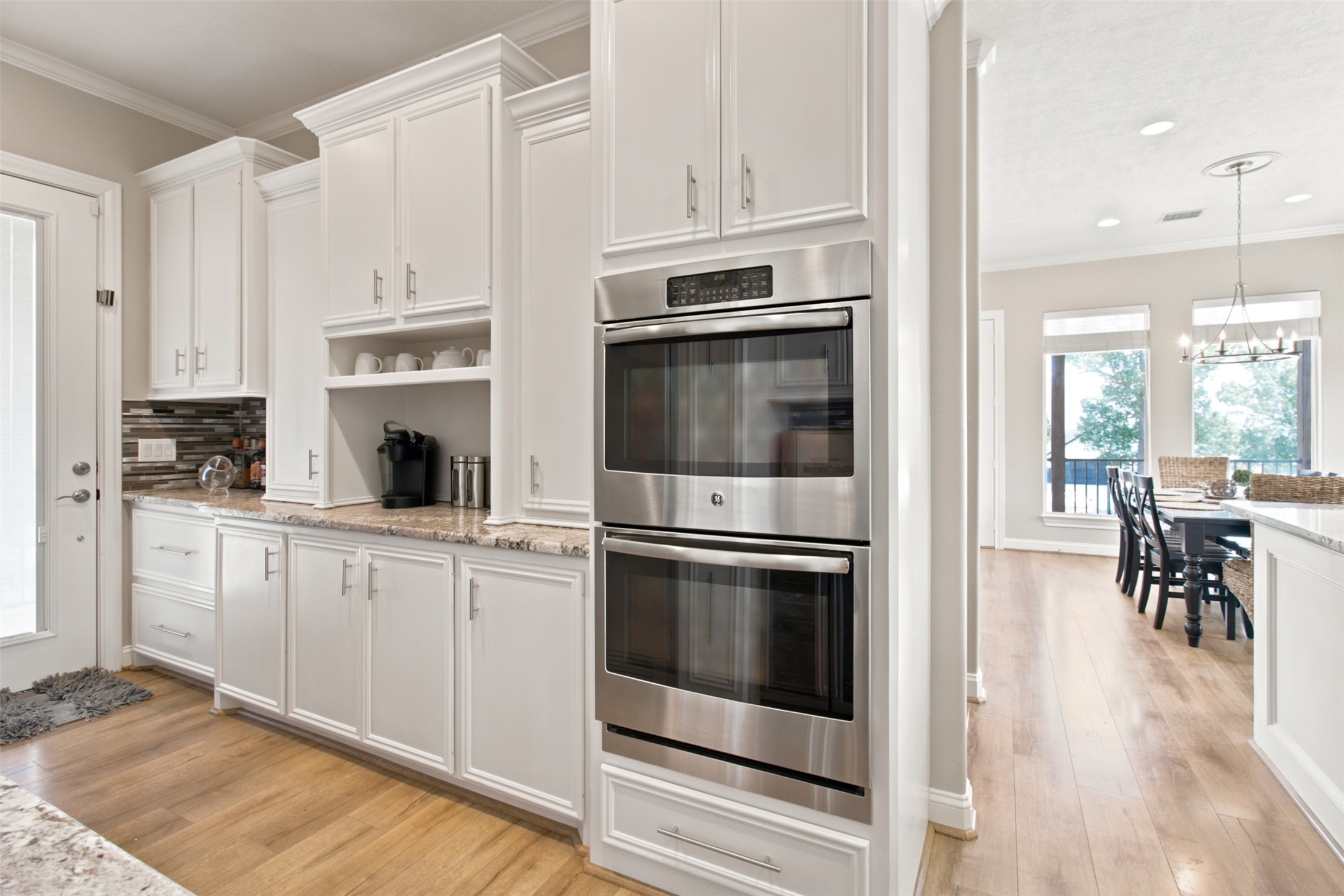 201 Coco Loop Point Blank, TX 77364 - Photo 25 of 41 3rd floor all stainless steel appliance. Double ovens, convection. Coffee bar, more kitchen cabinet storage spaces.