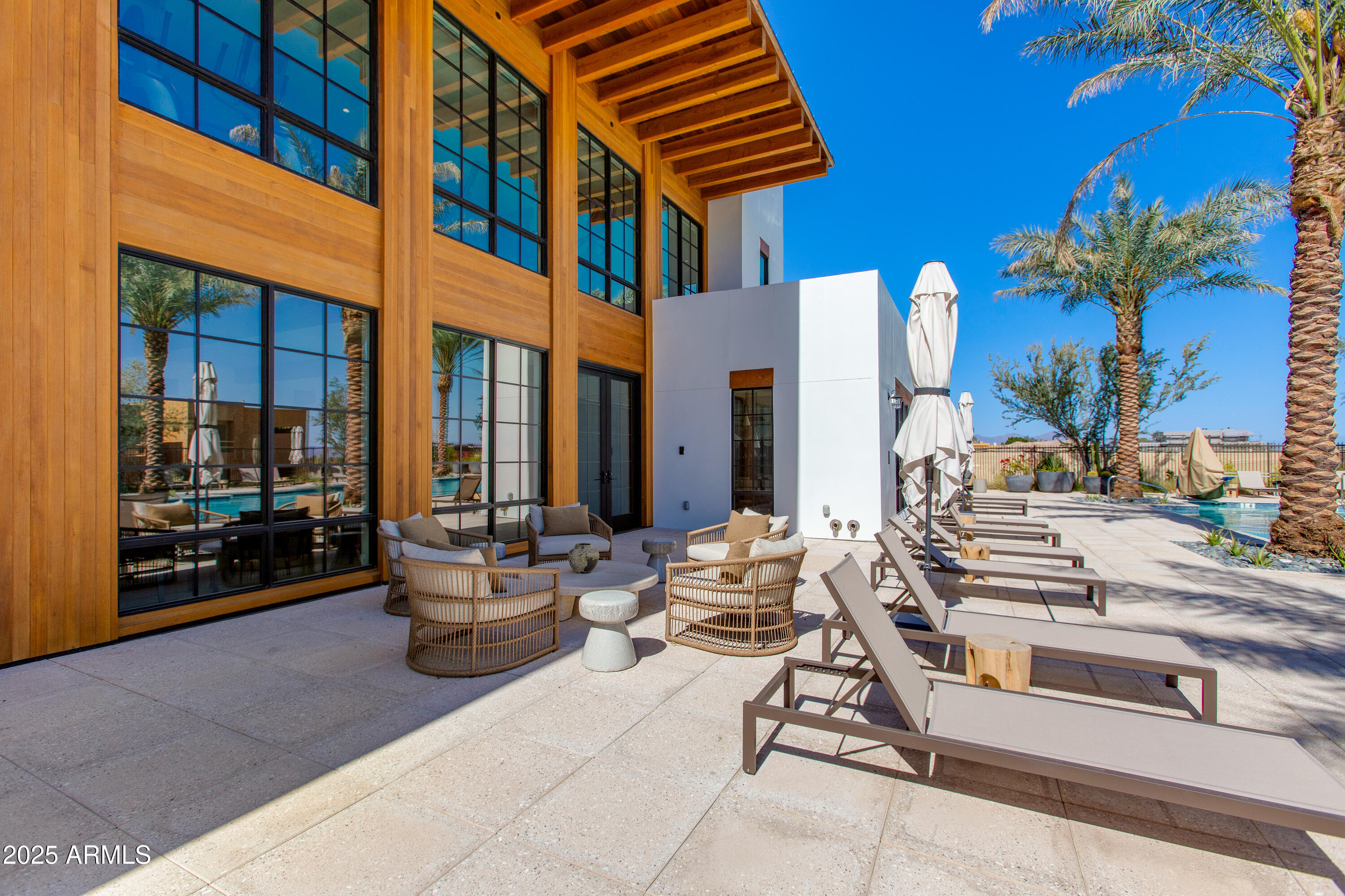 5000 North Camelback Ridge Drive, Unit 206 Scottsdale, AZ 85251 - Photo 51 of 62 a view of a patio with couches and potted plants