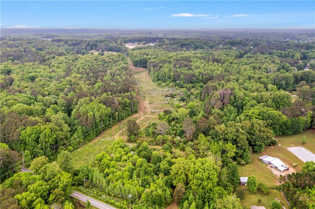 0 Mountain Road Alpharetta, GA 30004 - Photo 16 of 32 a view of a city with lush green forest