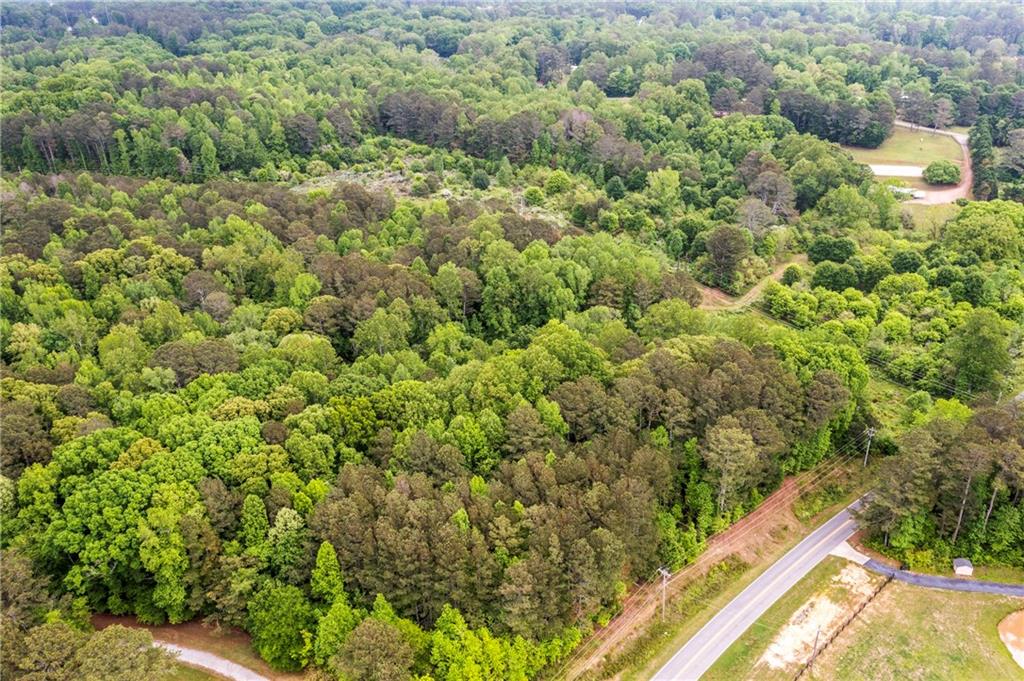 0 Mountain Road Alpharetta, GA 30004 - Photo 2 of 32 a view of a field with a tree