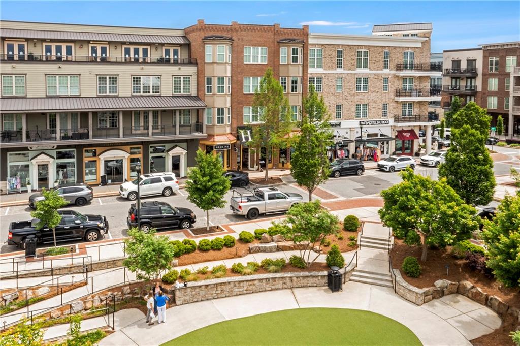 0 Mountain Road Alpharetta, GA 30004 - Photo 26 of 32 a front view of a building with outdoor seating