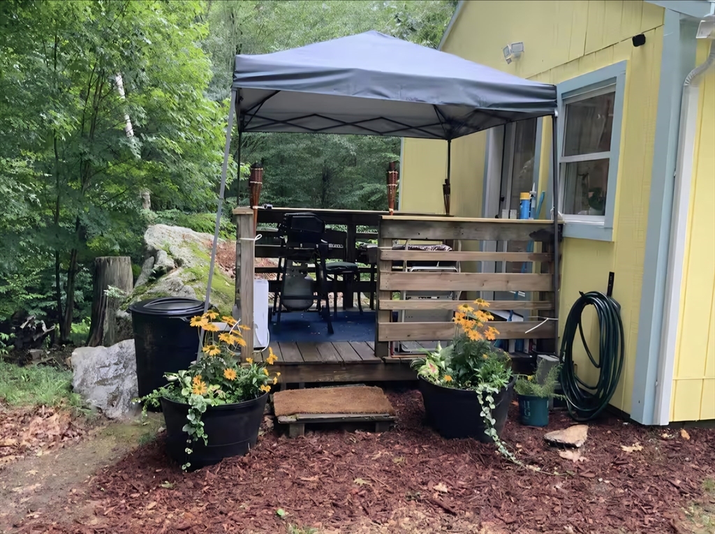 270 Wendell Depot Road Wendell, MA 01379 - Photo 31 of 42 a view of a patio with chairs and a flower pot