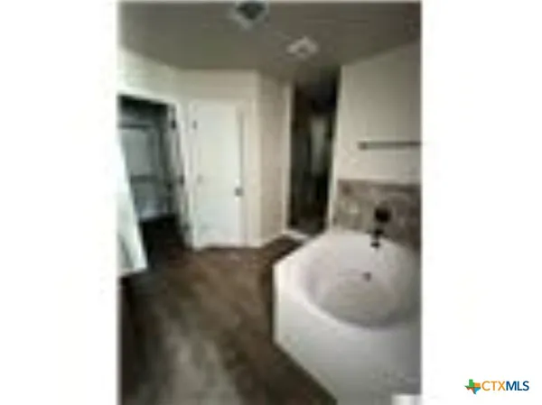 a bathroom with a sink and a tub