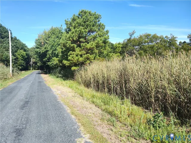 a view of a lake with a yard