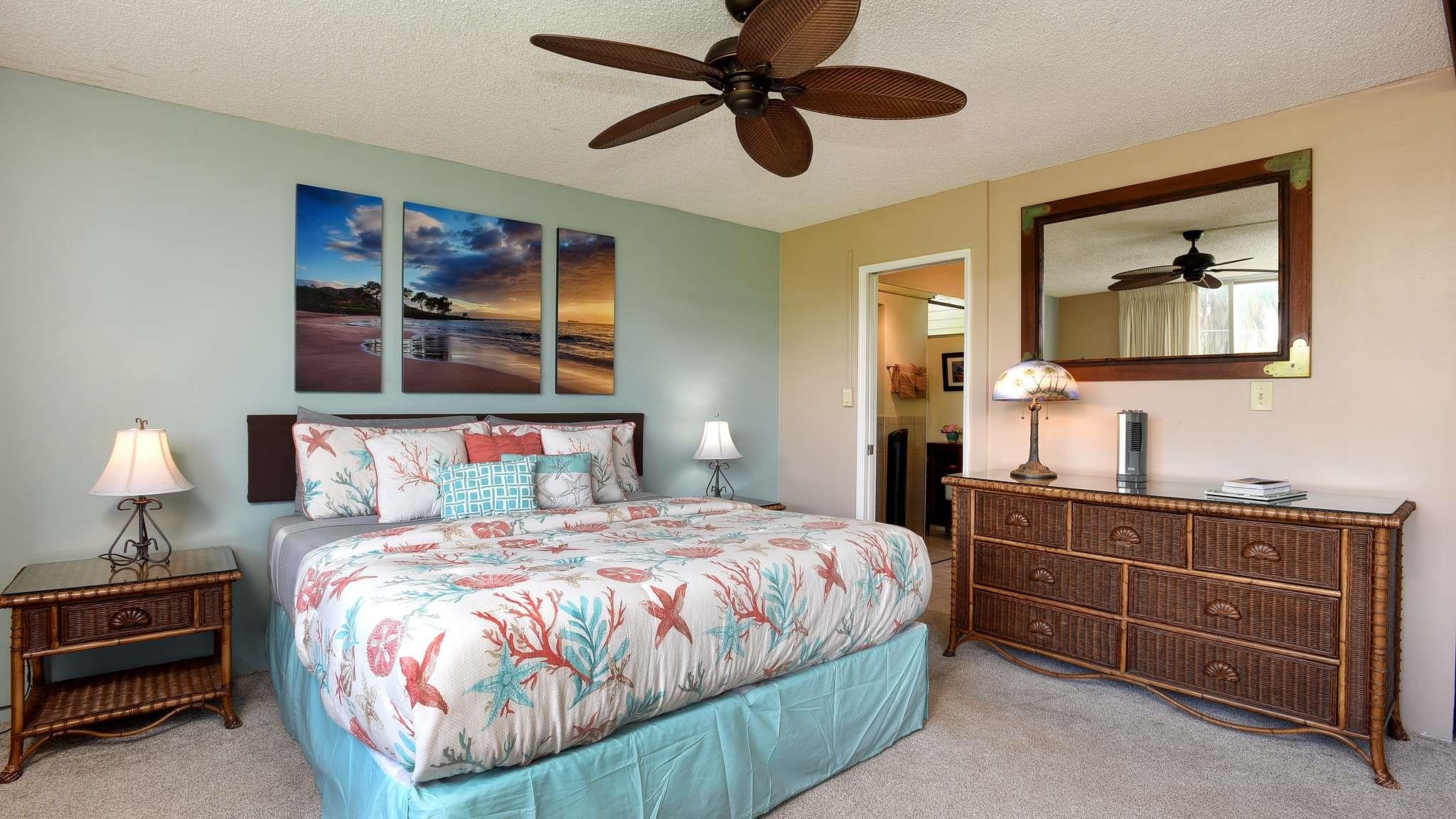 2619 South Kihei Road, Unit 309A Kihei, HI 96753 - Photo 20 of 41 a bedroom with a bed and dresser
