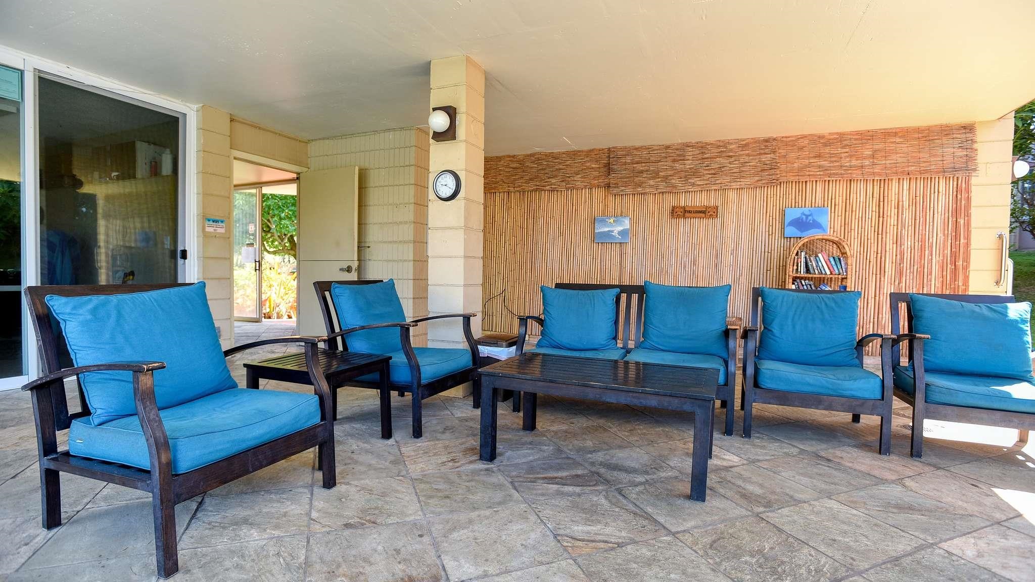 2619 South Kihei Road, Unit 309A Kihei, HI 96753 - Photo 27 of 41 a view of a chairs and a table in a patio