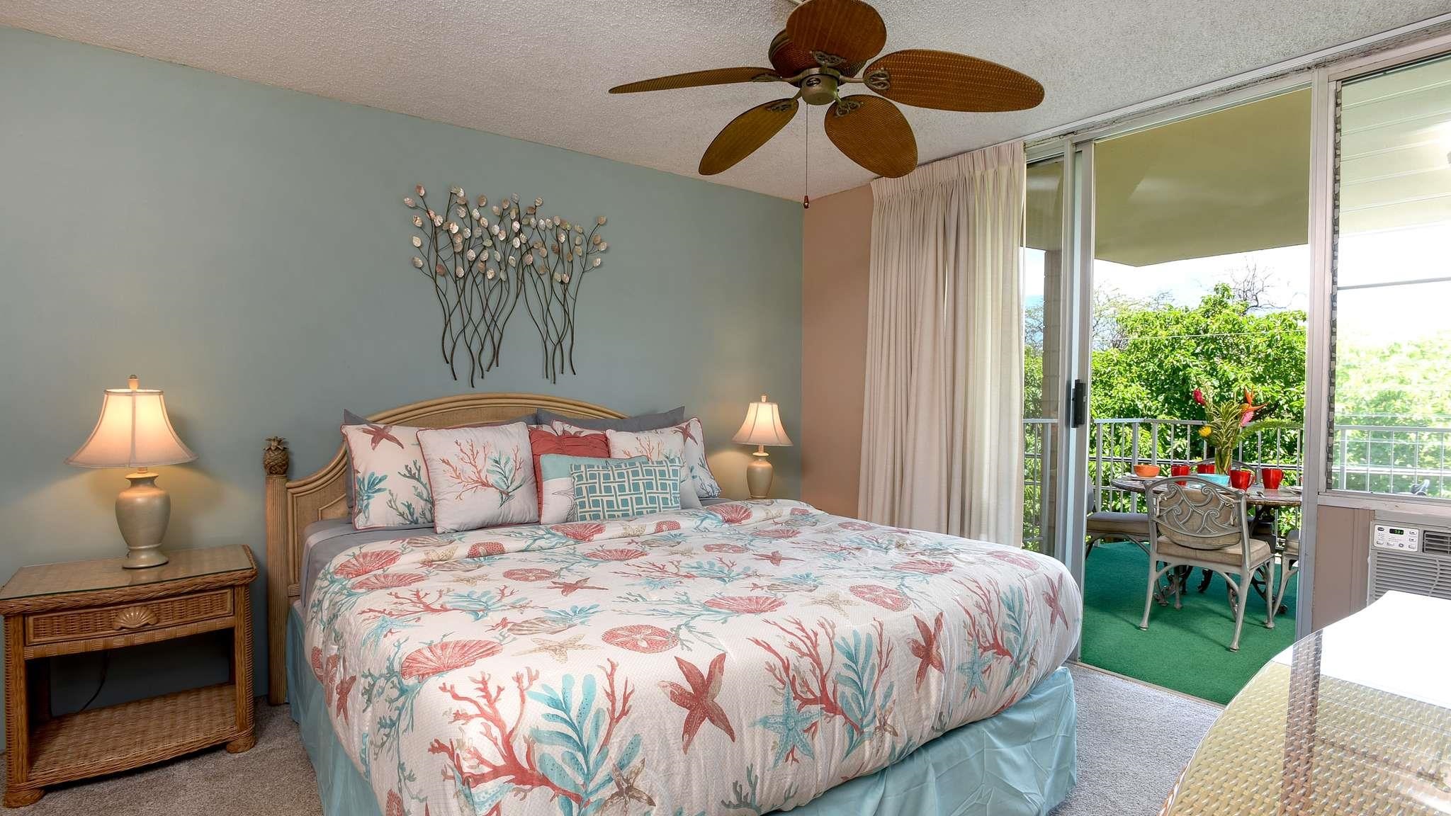 2619 South Kihei Road, Unit 309A Kihei, HI 96753 - Photo 6 of 41 a bedroom with a bed and a large window