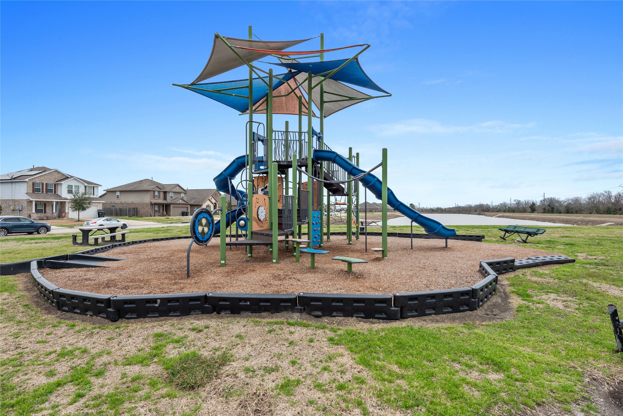 970 Jennifer Street Alvin, TX 77511 - Photo 27 of 27 a view of a house with swimming pool