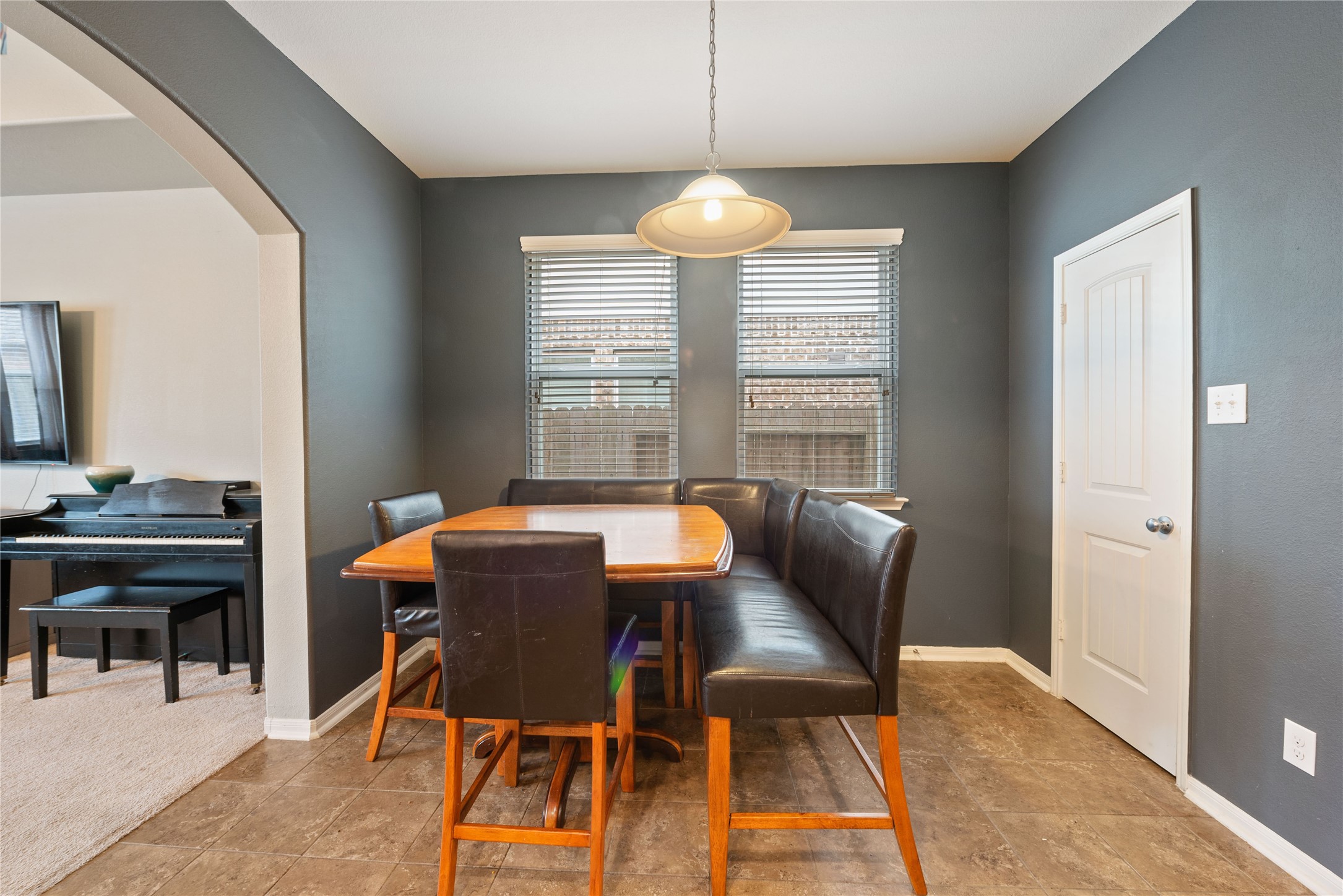 970 Jennifer Street Alvin, TX 77511 - Photo 6 of 27 a view of a dining room with furniture window and outside view