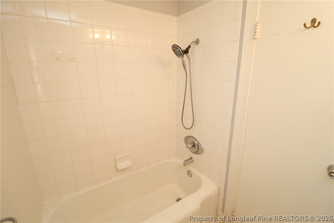 1000 Nichols Drive Raleigh, NC 27605 - Photo 21 of 22 a bathroom with a shower and a shower