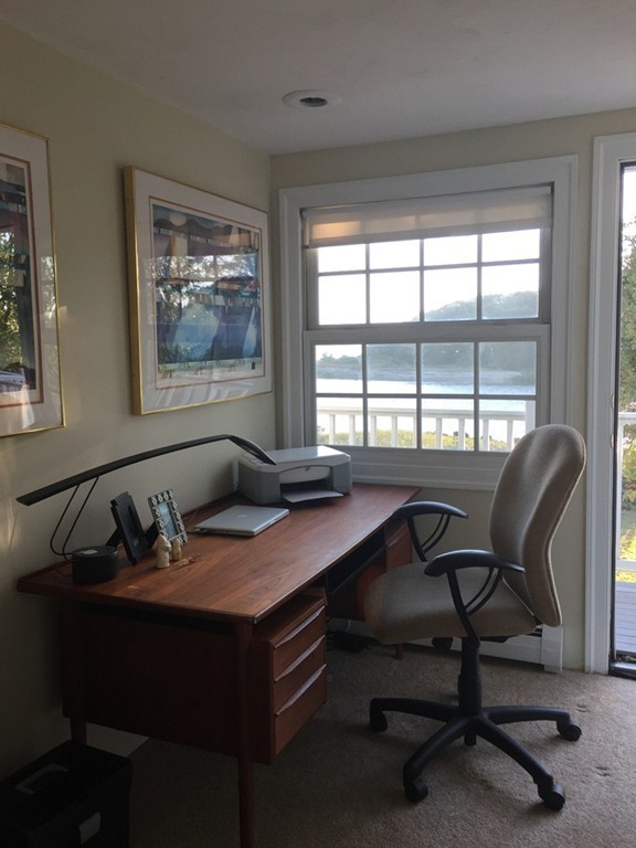 310 A Shore Road Bourne, MA 02532 - Photo 17 of 29 a view of a workspace with furniture and a window