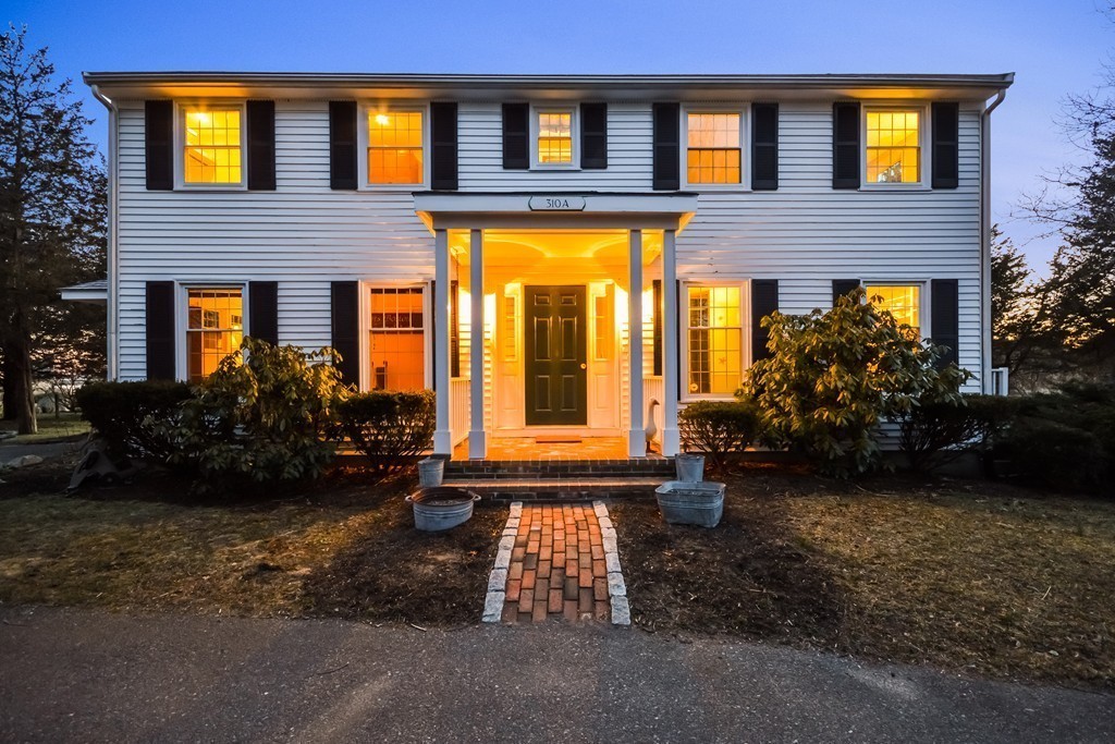 310 A Shore Road Bourne, MA 02532 - Photo 3 of 29 a front view of a house