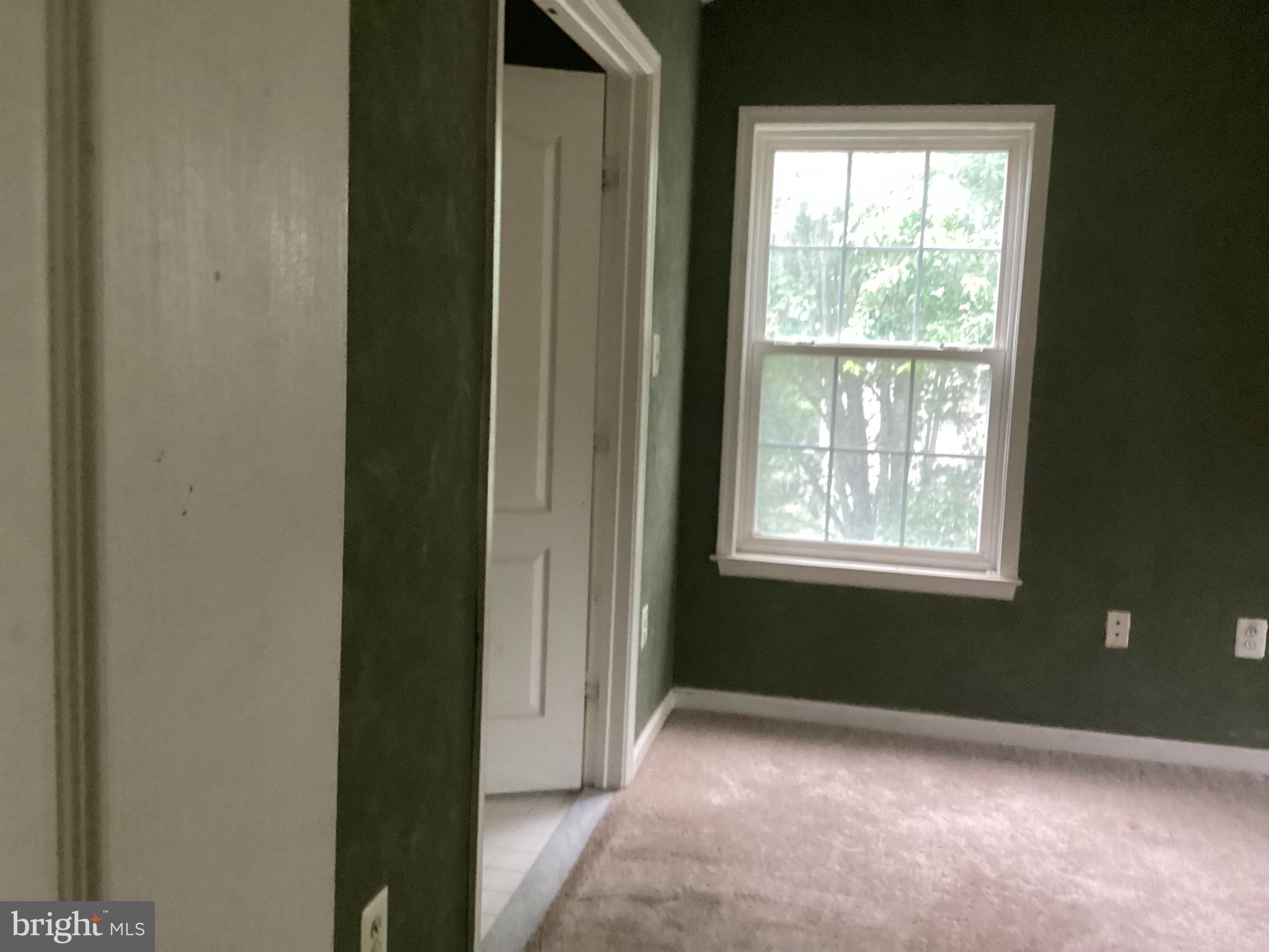 8207 Rison Drive Brandywine, MD 20613 - Photo 30 of 31 a view of an empty room with a window