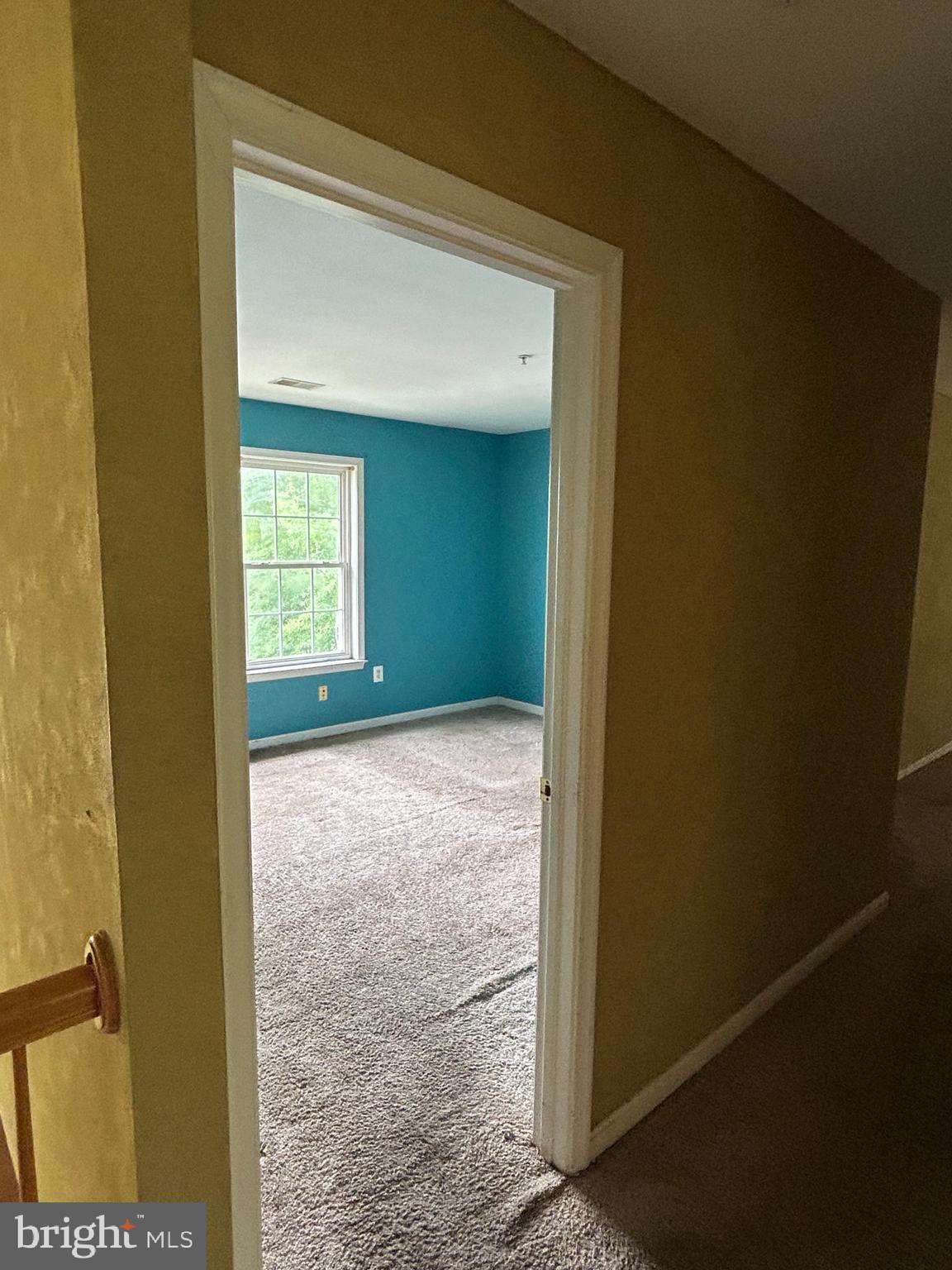 8207 Rison Drive Brandywine, MD 20613 - Photo 5 of 31 a view of an empty room with a window