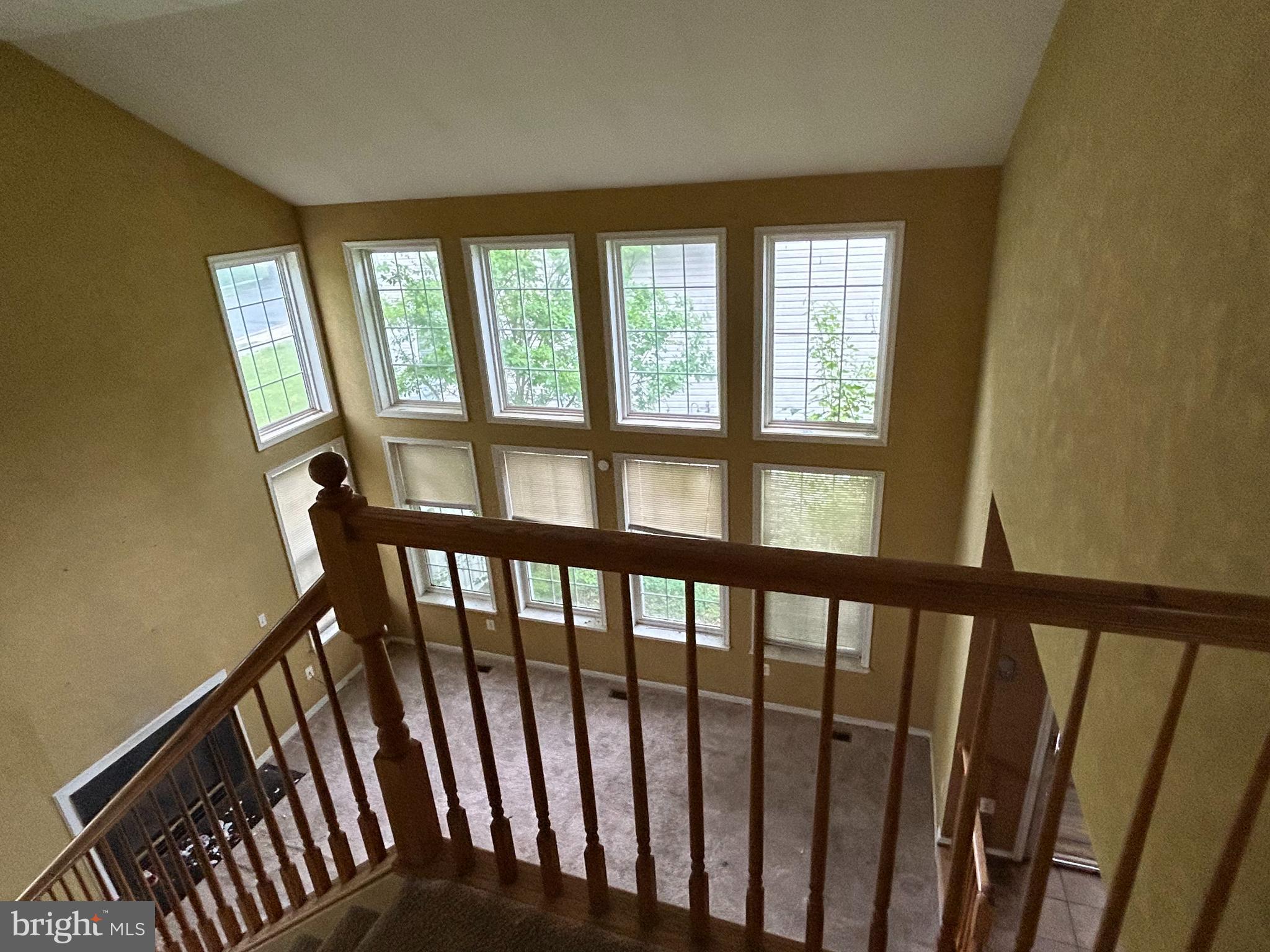 8207 Rison Drive Brandywine, MD 20613 - Photo 8 of 31 a view of a porch with wooden floor