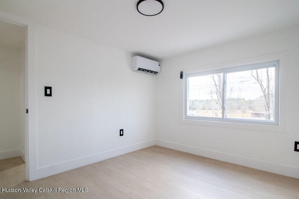 1732 Ulster Heights Road Ellenville, NY 12428 - Photo 37 of 40 an empty room with windows