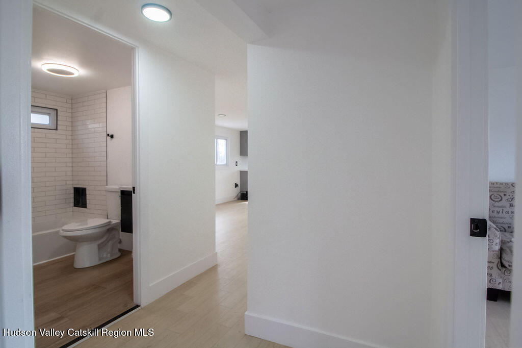 1732 Ulster Heights Road Ellenville, NY 12428 - Photo 38 of 40 a bathroom with a toilet and a shower