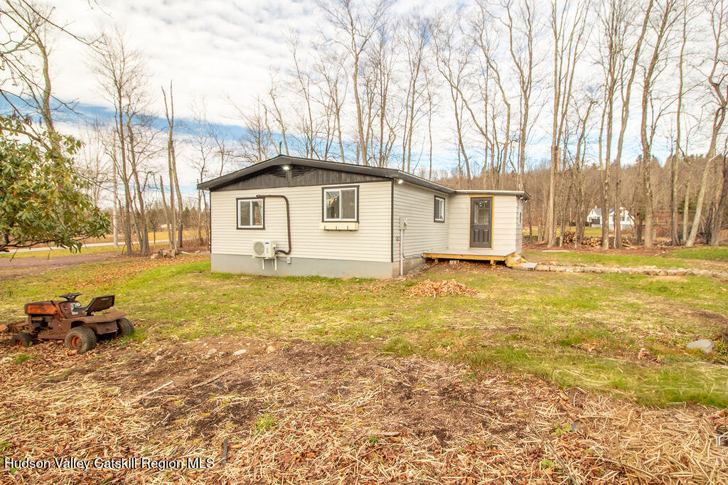1732 Ulster Heights Road Ellenville, NY 12428 - Photo 5 of 40 a front view of a house with a yard