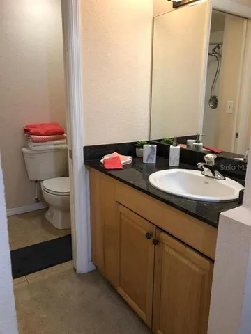 a bathroom with a sink and a toilet