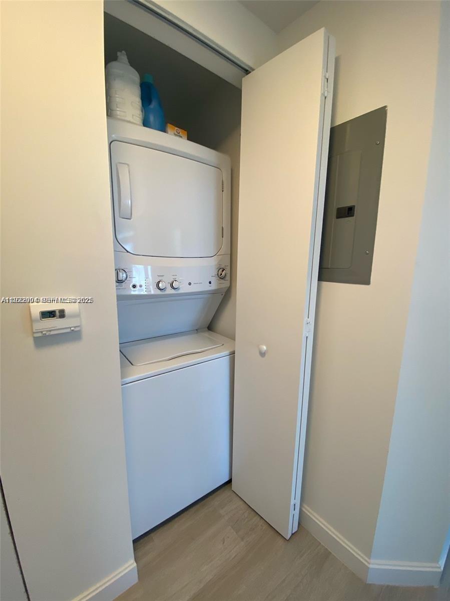 55 Southwest 9th Street, Unit 3001 Miami, FL 33130 - Photo 19 of 28 a utility room with dryer and washer