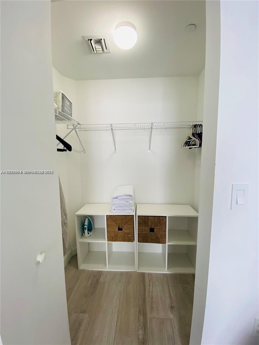 55 Southwest 9th Street, Unit 3001 Miami, FL 33130 - Photo 20 of 28 a view of a walk in closet