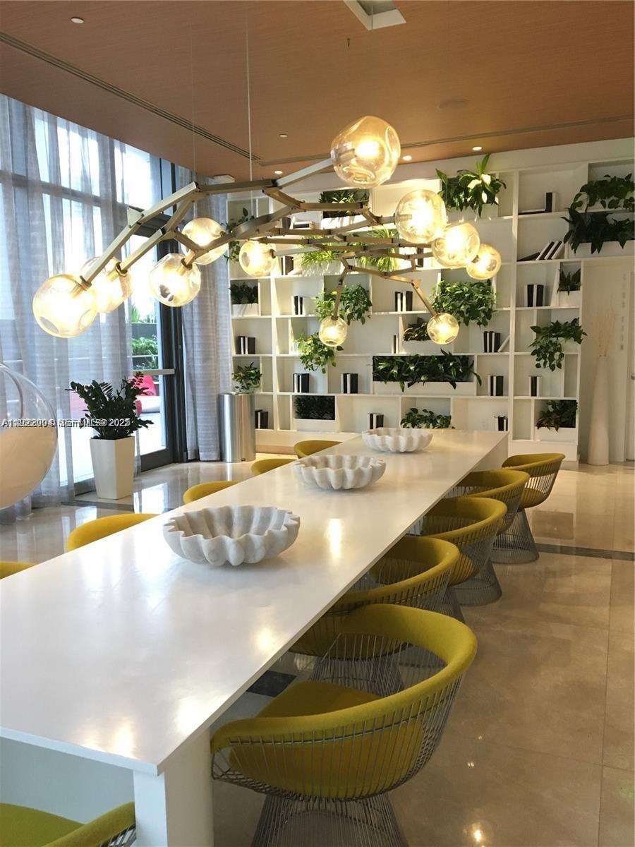 55 Southwest 9th Street, Unit 3001 Miami, FL 33130 - Photo 7 of 28 a room with pool table and chairs