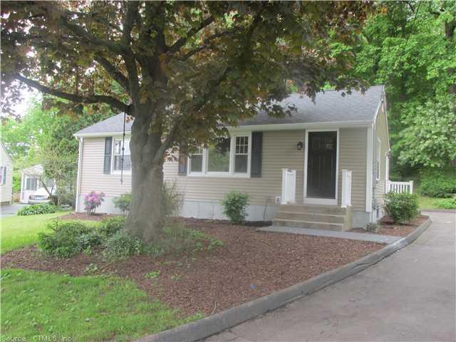 28 Forest Road Wallingford, CT 06492 - Photo 1 of 1 a front view of house with yard and green space