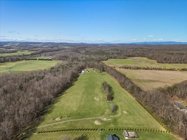 a view of a swimming pool with an ocean view