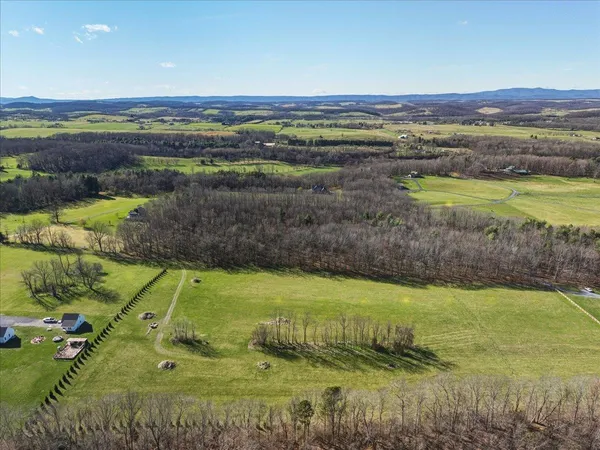 a view of a lake with a city