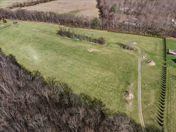 a view of a yard with an outdoor space