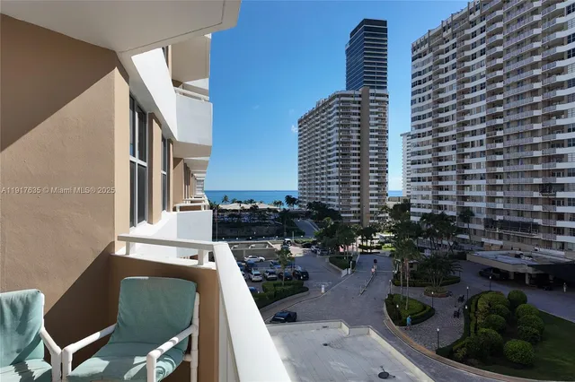 a view of balcony with outdoor seating and plants