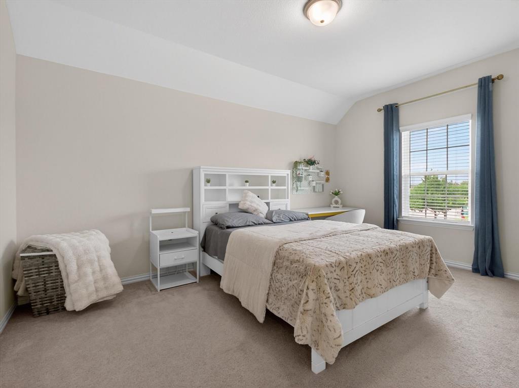 636 Corner Post Path Celina, TX 75009 - Photo 31 of 40 Carpeted bedroom with a single window featuring blinds and drapes