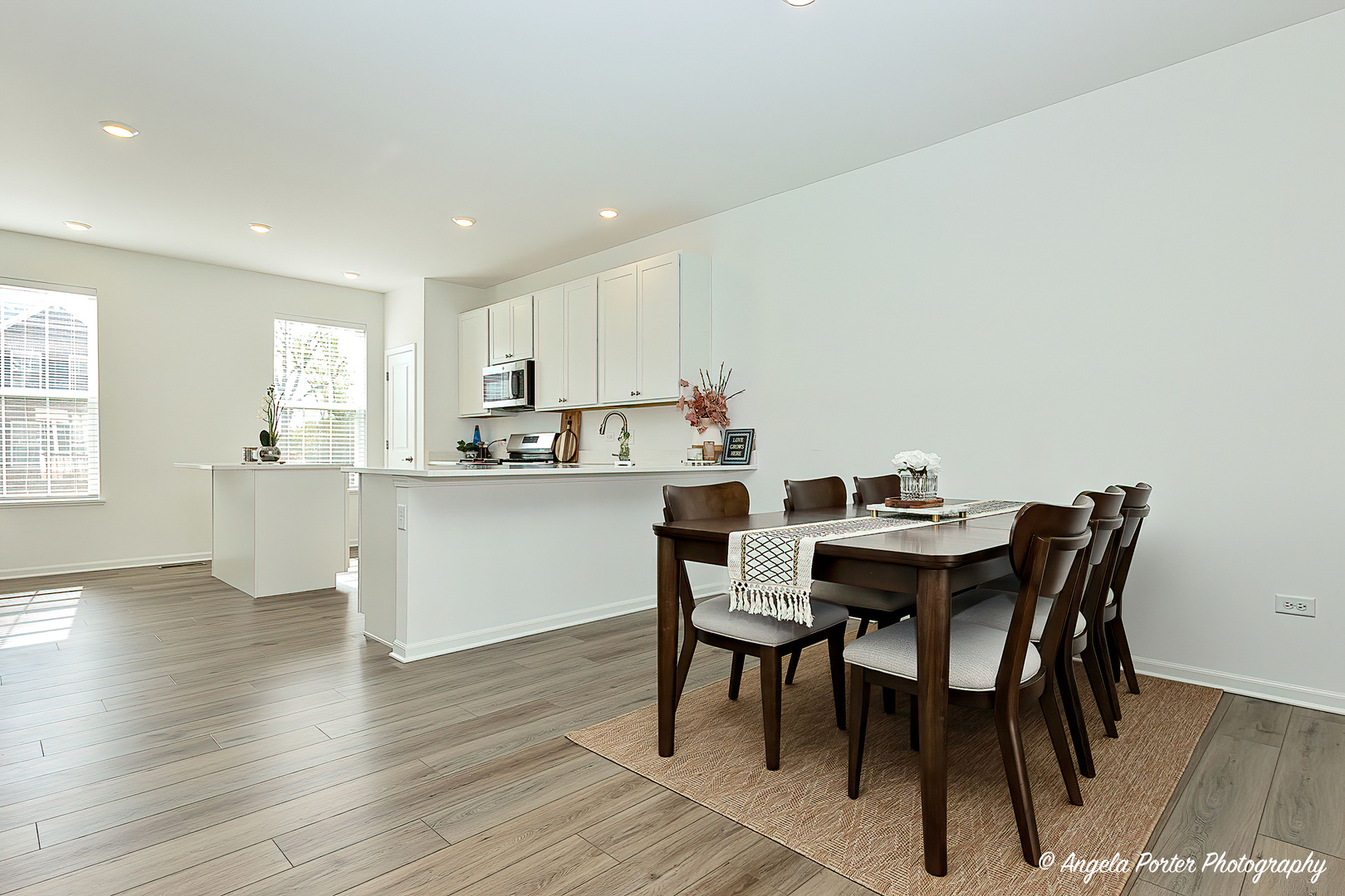 1004 Neubauer Circle Lindenhurst, IL 60046 - Photo 13 of 29 a kitchen with a table and chairs in it